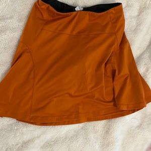 Orange tennis skirt